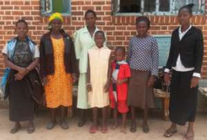 Johnathan (in red) at the orphanage