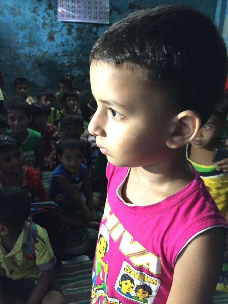 A child reciting poetry in a DoPeace school