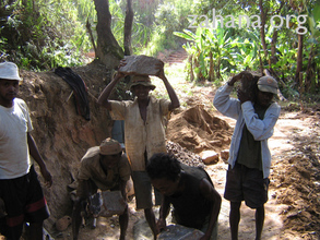 The community builds a new well