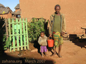 Fiadanana's traditional healer with granddaughter