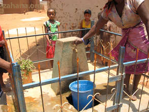 Fence around the communal water faucet