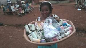 Mariama showing the supplies she's purchased