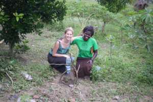 Concy and Georgia with Concy's tree seedling