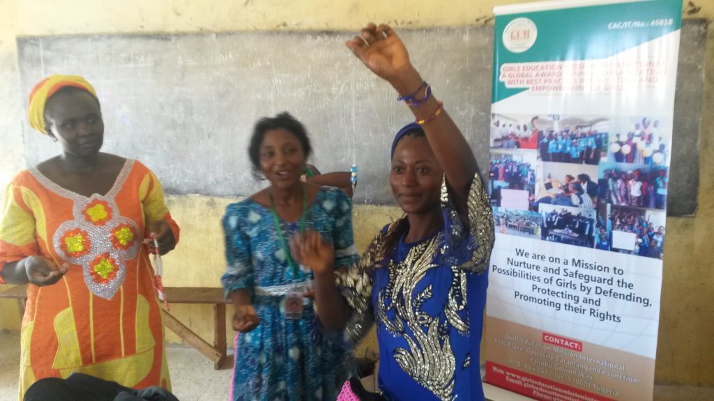 Dorcas, teaching school girls bead-making