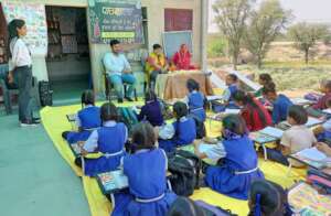 Visitor Guest interacting with beneficiaries girls