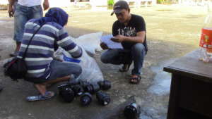 sibat technician inspecting pipe couplings