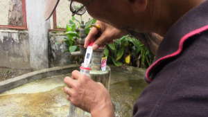 testing water temperature
