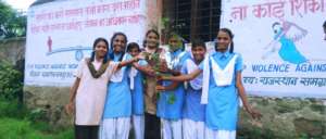 Girl Student are planting Trees