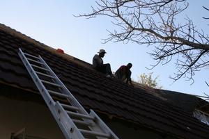 Working on the roof into the evening