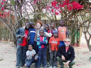 Ian and Michele with a group of Children at Daktari