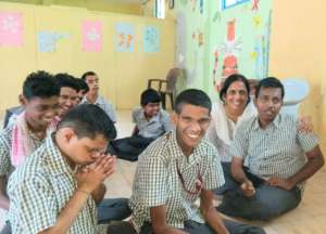 Volunteer Bhuvana at RASA with the group.