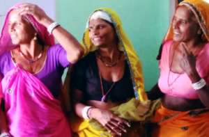 Happy Rural Women with mosquito net