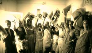 Happy Rural Women with mosquito net