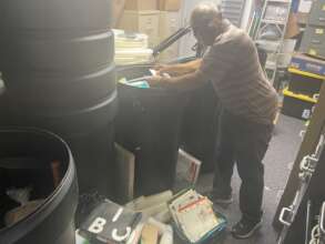Packing the school supplies into drums