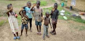 Liberian children at home while schools are closed