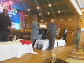 Receiving an award for our reconstruction work