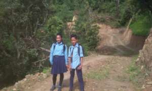 Reunified child going to school with his sister