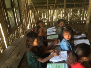 Children in a temporary learning centre
