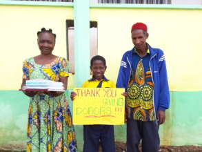 Ekobo with his grandparents
