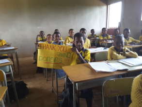Ekobo in his classroom