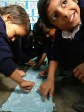 Using blue flour to show the colour of sky