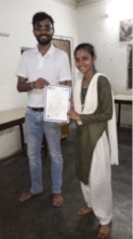 Ayesha receives basic computer course certificate