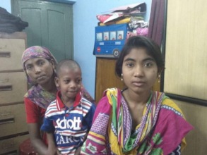 With mother & disabled brother - at our office