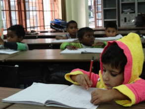 Children receive guidance with Homework