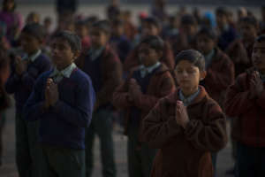 Prayers in progress during assembly