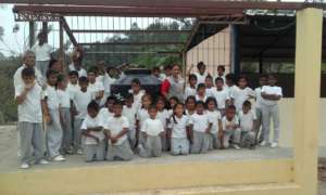 School kids receiving the water tank