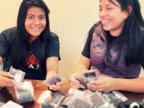 Our youngest team members preparing snacks