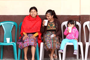 Sisters wait to be seen during clinic