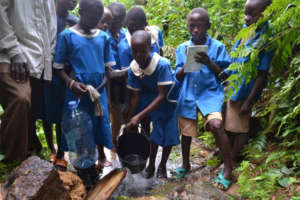 Students collecting water