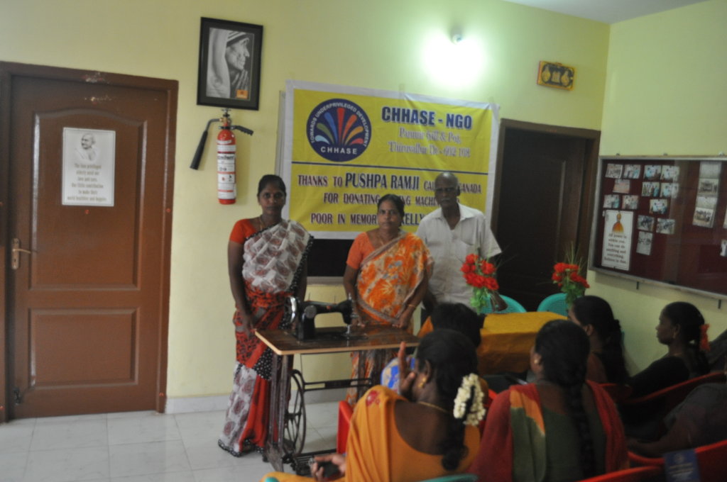 Sewing Machine to a Poor Women to Start Business