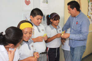 IAPE English teacher with his students