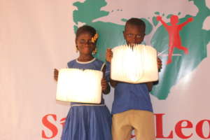 Two students show their new solar books