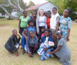 Happier times: McLane and hosts in Zimbabwe, 2019