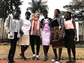 McLane with the girl ambassadors in Zimbabwe