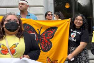 Aimee (right) campaigned for DACA in New Orleans