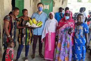 Jeremiah with mothers of migrants in Senegal