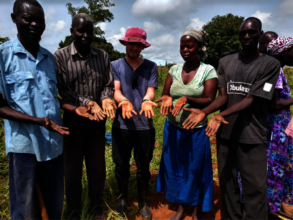 Peace Fellow Chris with GDPU in Uganda