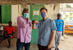 Jeremiah with former migrants in Senegal