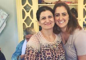Reina (r) at the Hope Workshop for refugees