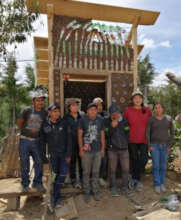 High School seniors building a dry compost latrine