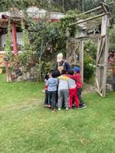 Students greet Noemie, a French education intern