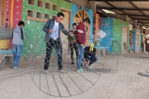 CETC students prepare the water tanks