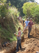 Gringas digging Paxan water line