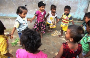Mittu playing with friends in the centre