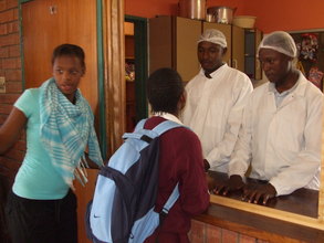 Our servers serving lunch to the children