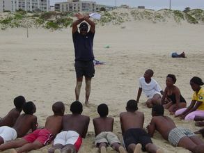 The kids listen attentively